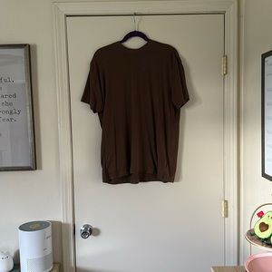 Brown skims shirt